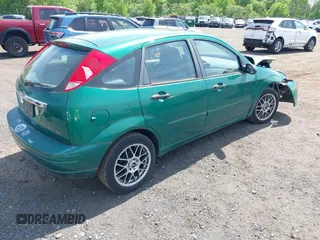 2002 Ford Focus ZX5 z VIN 3FAFP373X2R130965, wystawiony jako IAAI lot #42216638 z przebiegiem 59 236 mil mil oraz . Historia ofert i sprzedaży dostępna na DreamBid. Obrazek 4.