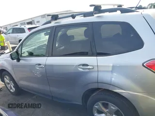 2014 Subaru Forester Premium with VIN JF2SJAGC0EH473208, listed as a IAAI auction lot 42800673 with 186,698 mi miles and . Bid and sale history available at DreamBid. Image 14.