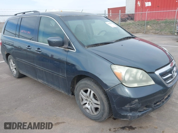2005 Honda Odyssey EX with VIN 5FNRL38465B108123, listed as a IAAI auction lot 41961270 with 169,948 mi miles. Bid and sale history available at carsss.com. Image 12.