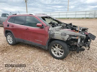 2016 Jeep Cherokee Altitude with VIN 1C4PJMCB3GW318329, listed as a Copart auction lot 56524905 with Not provided miles and Salvage title. Bid and sale history available at DreamBid. Image 4.