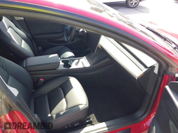 2021 Tesla Model 3 Long Range with VIN 5YJ3E1EB4MF936743, listed as a IAAI auction lot 42154322 with 46,983 mi miles and . Bid and sale history available at DreamBid. Image 5.