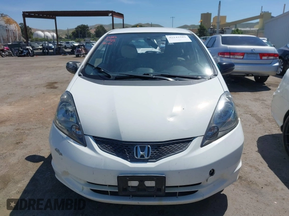 2009 Honda Fit z VIN JHMGE88239S045275, wystawiony jako IAAI lot #42142589 z przebiegiem 145 964 mil mil oraz . Historia ofert i sprzedaży dostępna na DreamBid. Obrazek 12.