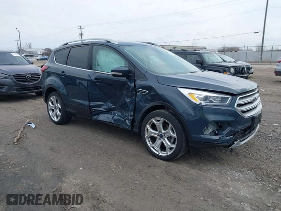 2019 Ford Escape Titanium with VIN 1FMCU9J95KUC28621, listed as a IAAI auction lot 41825297 with 60,373 mi miles. Bid and sale history available at carsss.com. Image 1.