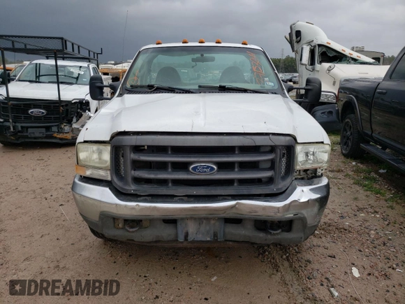 2004 Ford F-350 with VIN 1FDWF36P44EC05243, listed as a Copart auction lot 37153244 with 221,116 mi miles and Salvage title. Bid and sale history available at DreamBid. Image 5.