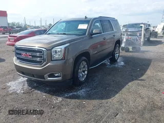 2016 GMC Yukon SLT with VIN 1GKS1BKC9GR328861, listed as a IAAI auction lot 42010839 with 200,711 mi miles. Bid and sale history available at carsss.com. Image 17.