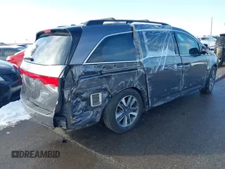 2015 Honda Odyssey Touring Elite with VIN 5FNRL5H98FB024958, listed as a IAAI auction lot 41361558 with 212,806 mi miles and . Bid and sale history available at DreamBid. Image 4.