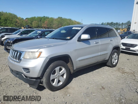 2011 Jeep Grand Cherokee Laredo with VIN 1J4RR4GG1BC714058, listed as a Copart auction lot 54974435 with 201,329 mi miles and Clean Title. Bid and sale history available at carsss.com. Image 1.