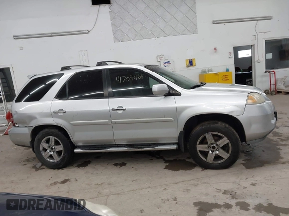 2005 Acura MDX Touring z VIN 2HNYD18855H511787, wystawiony jako IAAI lot #41709466 z przebiegiem 199 147 mil mil oraz . Historia ofert i sprzedaży dostępna na DreamBid. Obrazek 14.