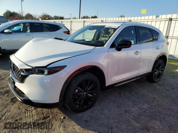 2022 Mazda CX-5 2.5 Turbo with VIN JM3KFBAY7N0597010, listed as a Copart auction lot 83062114 with 18,136 mi miles and Salvage Title. Bid and sale history available at carsss.com. Image 1.