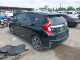 2015 Honda Fit EX-L z VIN 3HGGK5H81FM723962, wystawiony jako IAAI lot #42455367 z przebiegiem 104 859 mil mil oraz . Historia ofert i sprzedaży dostępna na DreamBid. Obrazek 3.