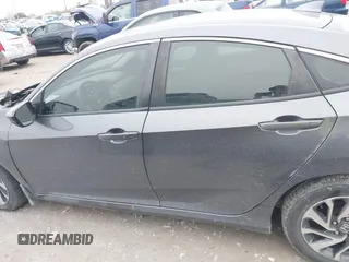 2018 Honda Civic EX with VIN 2HGFC2F79JH570403, listed as a IAAI auction lot 42018123 with 165,821 mi miles and . Bid and sale history available at DreamBid. Image 14.