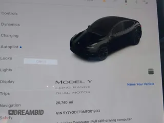 2021 Tesla Model Y Long Range with VIN 5YJYGDEE9MF301903, listed as a IAAI auction lot 42004007 with 26,740 mi miles. Bid and sale history available at carsss.com. Image 16.