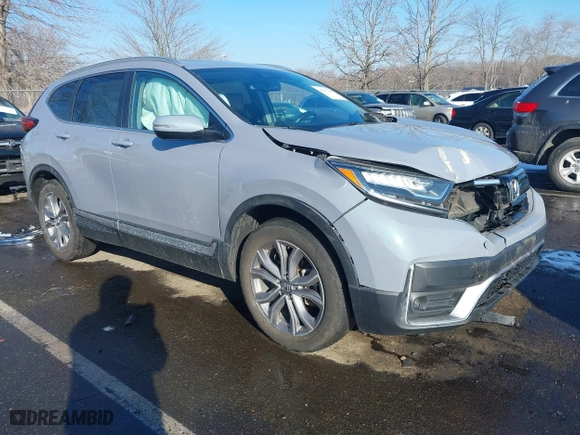 2021 Honda CR-V Touring with VIN 2HKRW2H97MH680203, listed as a IAAI auction lot 41357188 with 50,211 mi miles. Bid and sale history available at carsss.com. Image 1.