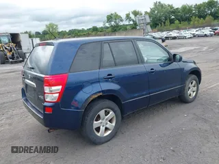 2012 Suzuki Grand Vitara Premium with VIN JS3TD0D67C4100790, listed as a IAAI auction lot 42760873 with 169,358 mi miles and . Bid and sale history available at DreamBid. Image 4.