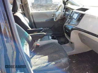 2014 Toyota Sienna SE with VIN 5TDXK3DC3ES521202, listed as a IAAI auction lot 41579320 with 182,982 mi miles and . Bid and sale history available at DreamBid. Image 5.