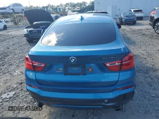 2017 BMW X4 M40i with VIN 5UXXW7C58H0U25599, listed as a Copart auction lot 61489334 with 115,001 mi miles and Salvage Title. Bid and sale history available at carsss.com. Image 6.