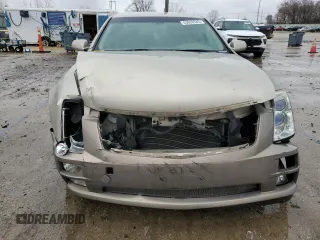 2007 Cadillac STS z VIN 1G6DW677970175897, wystawiony jako Copart lot #43030545 z przebiegiem 158 180 mil mil oraz Szkody całkowita. Historia ofert i sprzedaży dostępna na DreamBid. Obrazek 5.