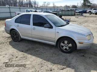 2004 Volkswagen Jetta GLS with VIN 3VWSR69M24M123449, listed as a Copart auction lot 48115325 with 302,443 mi miles and Salvage title. Bid and sale history available at DreamBid. Image 4.