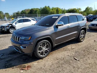 2017 Jeep Grand Cherokee Limited 75th Anniversary with VIN 1C4RJFBT2HC949168, listed as a Copart auction lot 77411594 with 146,458 mi miles and Salvage title. Bid and sale history available at DreamBid. Image 1.
