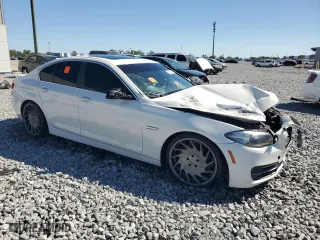2014 BMW 5 Series 535i with VIN WBA5B1C53ED479380, listed as a Copart auction lot 50134015 with 151,247 mi miles and Salvage Title. Bid and sale history available at carsss.com. Image 4.