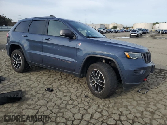 2021 Jeep Grand Cherokee Trailhawk with VIN 1C4RJFLG0MC525273, listed as a Copart auction lot 49632275 with 57,452 mi miles and Salvage title. Bid and sale history available at DreamBid. Image 4.