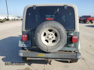 2003 Jeep Wrangler Sahara with VIN 1J4FA59S93P376775, listed as a Copart auction lot 53979415 with 93,995 mi miles and Salvage title. Bid and sale history available at DreamBid. Image 6.