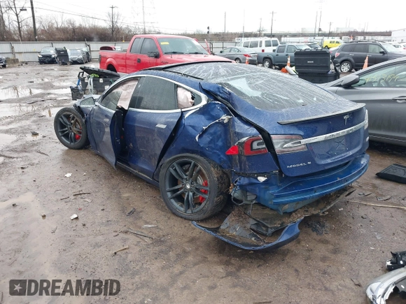 2016 Tesla Model S 90D with VIN 5YJSA1E44GF169960, listed as a IAAI auction lot 41523807 with 124,738 mi miles and . Bid and sale history available at DreamBid. Image 3.