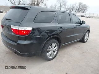 2011 Dodge Durango Heat with VIN 1D4RE3GG9BC687514, listed as a IAAI auction lot 41404030 with 222,562 mi miles. Bid and sale history available at carsss.com. Image 4.