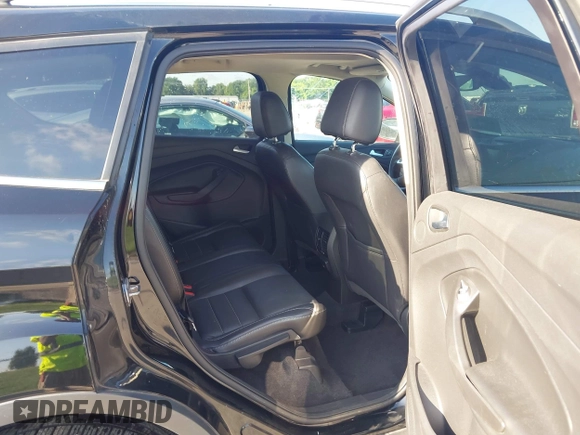 2016 Ford Escape Titanium with VIN 1FMCU9J97GUC21242, listed as a IAAI auction lot 42431567 with 96,946 mi miles and . Bid and sale history available at DreamBid. Image 8.