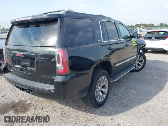 2015 GMC Yukon SLT with VIN 1GKS1BKC1FR539194, listed as a IAAI auction lot 41864424 with 1 mi miles. Bid and sale history available at carsss.com. Image 4.