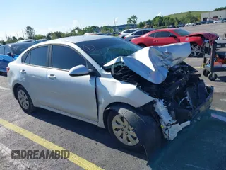 2018 Kia Rio LX with VIN 3KPA24AB0JE054428, listed as a IAAI auction lot 40101162 with 107,857 mi miles. Bid and sale history available at carsss.com. Image 1.