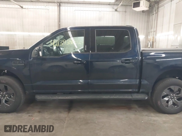 2023 Ford F-150 Lightning Pro with VIN 1FTVW1EL4PWG22900, listed as a IAAI auction lot 42139391 with 6,569 mi miles and . Bid and sale history available at DreamBid. Image 15.