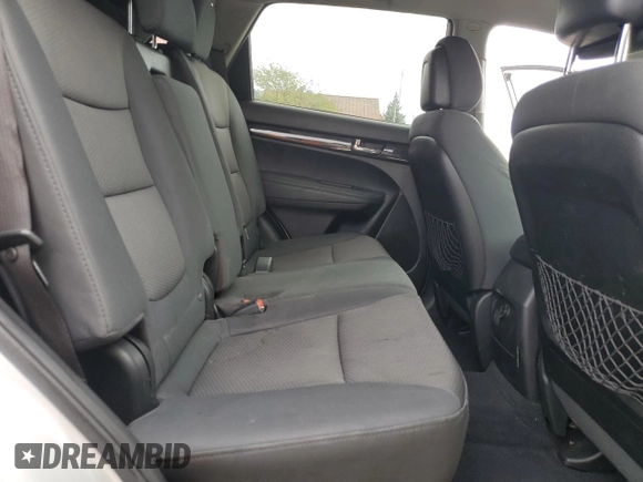 2013 Kia Sorento LX z VIN 5XYKT4A67DG355452, wystawiony jako Copart lot #54902255 z przebiegiem 188 949 mil mil oraz Szkoda całkowita • Salvage title. Historia ofert i sprzedaży dostępna na DreamBid. Obrazek 11.