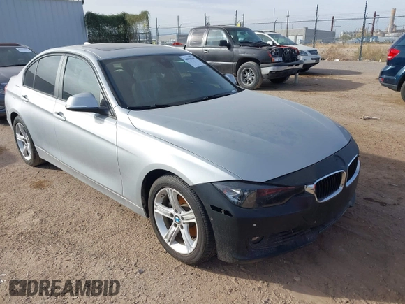 2015 BMW 3 Series 328i with VIN WBA3A5C58FF610035, listed as a IAAI auction lot 40986949 with 73,083 mi miles. Bid and sale history available at carsss.com. Image 1.