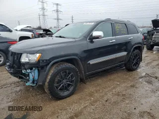 2013 Jeep Grand Cherokee Overland with VIN 1C4RJFCT9DC615096, listed as a Copart auction lot 86817074 with 112,421 mi miles and Salvage Title. Bid and sale history available at carsss.com. Image 1.