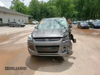 2015 Ford Escape Titanium with VIN 1FMCU9J93FUC86300, listed as a Copart auction lot 60852895 with 156,296 mi miles and Salvage title. Bid and sale history available at DreamBid. Image 14.