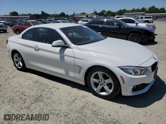 2015 BMW 4 Series 428i with VIN WBA3V7C59FP771861, listed as a Copart auction lot 56562525 with 64,273 mi miles and Salvage title. Bid and sale history available at DreamBid. Image 4.