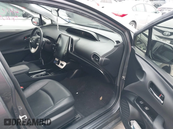 2018 Toyota Prius Plus with VIN JTDKARFPXJ3087064, listed as a IAAI auction lot 41433495 with 118,298 mi miles and . Bid and sale history available at DreamBid. Image 5.
