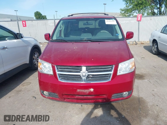 2009 Dodge Grand Caravan SXT z VIN 2D8HN541X9R589227, wystawiony jako IAAI lot #42393785 z przebiegiem Nie podano mil oraz . Historia ofert i sprzedaży dostępna na DreamBid. Obrazek 10.