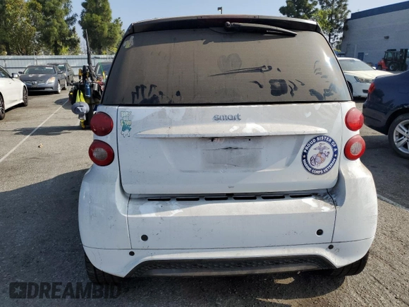 2014 Smart fortwo Pure z VIN WMEEJ3BA3EK780633, wystawiony jako Copart lot #54009185 z przebiegiem 104 688 mil mil oraz Tytuł czysty. Historia ofert i sprzedaży dostępna na DreamBid. Obrazek 6.