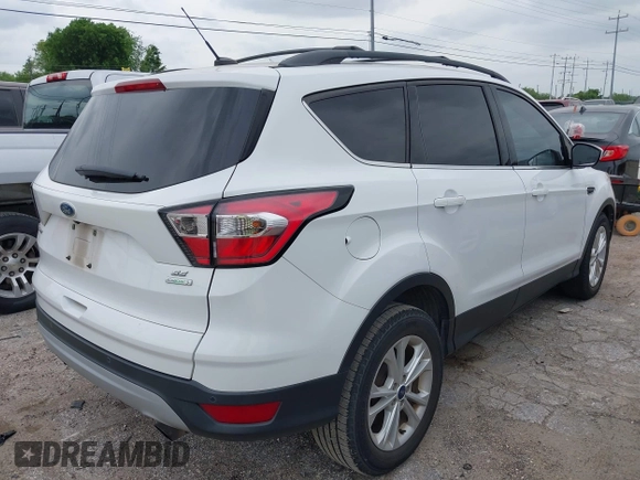2017 Ford Escape SE with VIN 1FMCU0GD0HUD19621, listed as a IAAI auction lot 42123026 with 105,664 mi miles and . Bid and sale history available at carsss.com. Image 4.