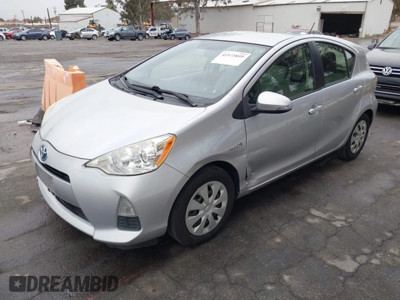 2014 Toyota Prius One with VIN JTDKDTB33E1067408, listed as a IAAI auction lot 41573895 with 245,383 mi miles and . Bid and sale history available at DreamBid. Image 2.