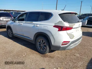 2019 Hyundai Santa Fe SE z VIN 5NMS23AD7KH058499, wystawiony jako IAAI lot #41963798 z przebiegiem Nie podano mil oraz . Historia ofert i sprzedaży dostępna na DreamBid. Obrazek 3.