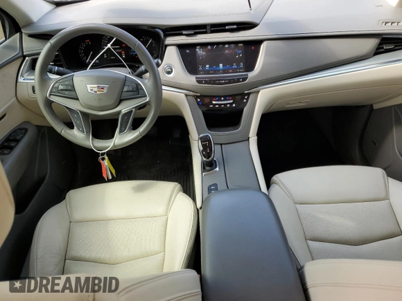 2018 Cadillac XT5 Premium Luxury AWD with VIN 1GYKNFRS2JZ133531, listed as a Copart auction lot 57814925 with 87,998 mi miles and Salvage title. Bid and sale history available at DreamBid. Image 8.