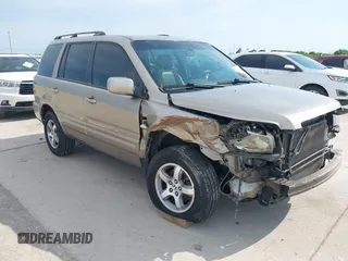 2006 Honda Pilot EX-L with VIN 5FNYF18586B028291, listed as a IAAI auction lot 42040904 with 217,038 mi miles and . Bid and sale history available at carsss.com. Image 1.