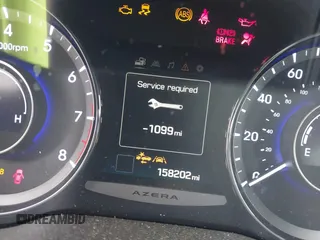 2016 Hyundai Azera Limited z VIN KMHFH4JGXGA568911, wystawiony jako IAAI lot #41428434 z przebiegiem 158 202 mil mil oraz . Historia ofert i sprzedaży dostępna na DreamBid. Obrazek 7.