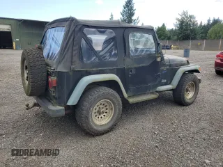 1998 Jeep Wrangler Sport z VIN 1J4FY19S7WP801709, wystawiony jako Copart lot #64495985 z przebiegiem 260 798 mil mil oraz Czysty tytuł • Clean title. Historia ofert i sprzedaży dostępna na DreamBid. Obrazek 3.