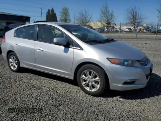 2010 Honda Insight EX z VIN JHMZE2H74AS034758, wystawiony jako Copart lot #52905445 z przebiegiem 154 148 mil mil oraz Szkoda całkowita • Salvage title. Historia ofert i sprzedaży dostępna na DreamBid. Obrazek 4.