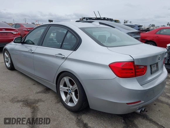 2014 BMW 3 Series 328i with VIN WBA3C1C53EK109613, listed as a IAAI auction lot 41713060 with 141,240 mi miles. Bid and sale history available at carsss.com. Image 3.