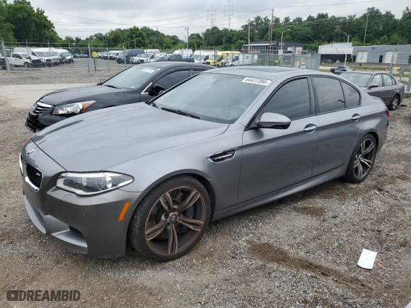 2014 BMW M5 with VIN WBSFV9C52ED593120, listed as a Copart auction lot 64427394 with 80,546 mi miles and Clean Title. Bid and sale history available at carsss.com. Image 1.